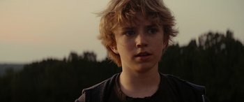 Movie still from “Secret Headquarters” (2022), directed by Henry Joost – A person wearing a jacket; Close Up shot, Over the shoulder angle