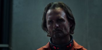 Movie still from “Secret Society of Second Born Royals” (2020), directed by Anna Mastro – A person wearing a neck brace; Close Up shot, Low angle