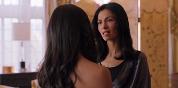 Movie still from “Secret Society of Second Born Royals” (2020), directed by Anna Mastro – A woman looking at her reflection in a mirror; Close Up shot, Over the shoulder angle