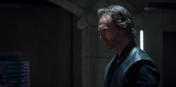 Movie still from “Secret Society of Second Born Royals” (2020), directed by Anna Mastro – A person wearing a black shirt; Close Up shot, Over the shoulder angle