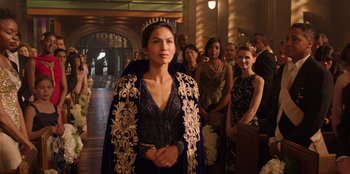 Movie still from “Secret Society of Second Born Royals” (2020), directed by Anna Mastro – A group of people standing in a room; Close Up shot, Over the shoulder angle