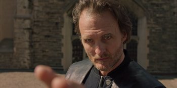 Movie still from “Secret Society of Second Born Royals” (2020), directed by Anna Mastro – A person looking at a cell phone; Close Up shot, Over the shoulder angle