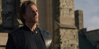 Movie still from “Secret Society of Second Born Royals” (2020), directed by Anna Mastro – A person wearing a leather jacket; Close Up shot, Over the shoulder angle