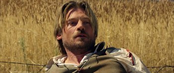 Movie still from “Blackthorn” (2011), directed by Mateo Gil – A person with long hair; Close Up shot, Over the shoulder angle