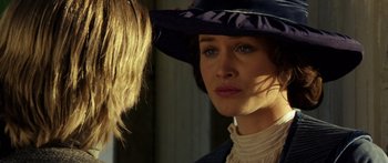 Movie still from “Blackthorn” (2011), directed by Mateo Gil – A person wearing a hat; Close Up shot, Over the shoulder angle