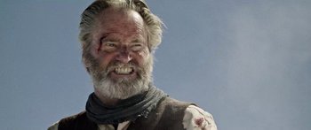 Movie still from “Blackthorn” (2011), directed by Mateo Gil – An old man with a beard and a white mustache; Close Up shot, Low angle