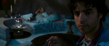 Movie still from “Serenity” (2005), directed by Joss Whedon – A man and a woman are sitting in a room; Close Up shot, Over the shoulder angle