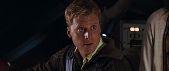 Movie still from “Serenity” (2005), directed by Joss Whedon – A person wearing a jacket; Close Up shot, Low angle