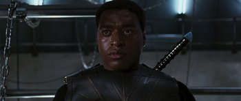 Movie still from “Serenity” (2005), directed by Joss Whedon – A person with a sword; Close Up shot, Low angle