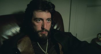 Movie still from “Serpico” (1973), directed by Sidney Lumet – A person with a beard; Close Up shot, Low angle