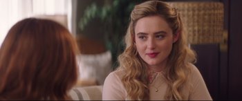 Movie still from “Blockers” (2018), directed by Kay Cannon – A person sitting on a couch; Close Up shot, Over the shoulder angle