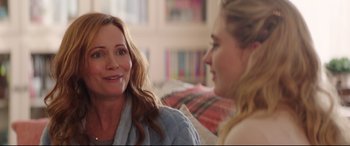 Movie still from “Blockers” (2018), directed by Kay Cannon – Two women sitting on a couch talking to each other; Close Up shot, Over the shoulder angle