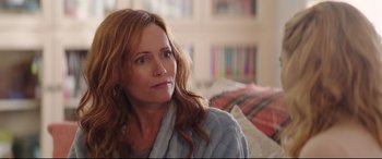 Movie still from “Blockers” (2018), directed by Kay Cannon – A person sitting on a bed; Close Up shot, Over the shoulder angle