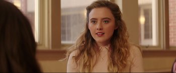 Movie still from “Blockers” (2018), directed by Kay Cannon – A woman with long blonde hair wearing a pink shirt; Close Up shot, Over the shoulder angle