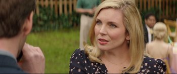 Movie still from “Blockers” (2018), directed by Kay Cannon – A person wearing a dress; Close Up shot, Over the shoulder angle