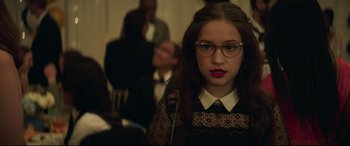 Movie still from “Blockers” (2018), directed by Kay Cannon – A woman with glasses is looking at the camera; Close Up shot, Over the shoulder angle