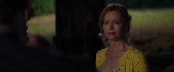 Movie still from “Blockers” (2018), directed by Kay Cannon – A person wearing a yellow shirt; Close Up shot, Over the shoulder angle