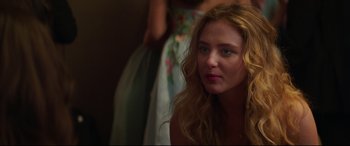 Movie still from “Blockers” (2018), directed by Kay Cannon – A beautiful young woman with long blonde hair; Close Up shot, Over the shoulder angle