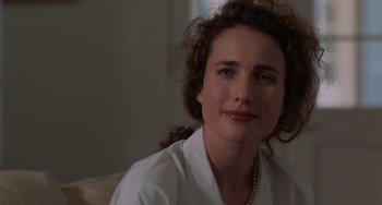 Movie still from “Sex, Lies, and Videotape” (1989), directed by Steven Soderbergh – A person wearing a white shirt; Close Up shot, Over the shoulder angle