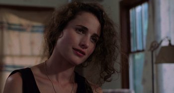 Movie still from “Sex, Lies, and Videotape” (1989), directed by Steven Soderbergh – A person wearing a necklace; Close Up shot, Over the shoulder angle
