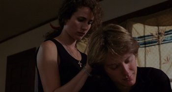 Movie still from “Sex, Lies, and Videotape” (1989), directed by Steven Soderbergh – A young woman combing another young woman's hair; Close Up shot, Low angle