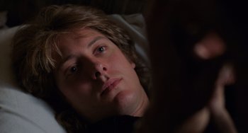 Movie still from “Sex, Lies, and Videotape” (1989), directed by Steven Soderbergh – A person laying in a bed; Close Up shot, Overhead angle