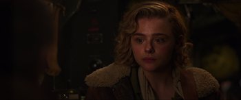 Movie still from “Shadow in the Cloud” (2020), directed by Roseanne Liang – A person wearing a jacket; Close Up shot, Over the shoulder angle