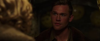 Movie still from “Shadow in the Cloud” (2020), directed by Roseanne Liang – A person looking at the camera; Close Up shot, Over the shoulder angle