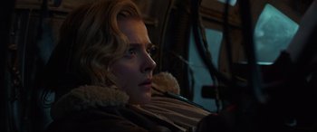 Movie still from “Shadow in the Cloud” (2020), directed by Roseanne Liang – A person sitting in a car; Close Up shot, Low angle