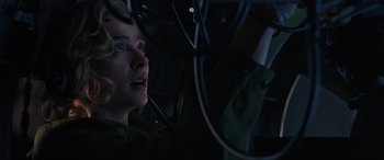 Movie still from “Shadow in the Cloud” (2020), directed by Roseanne Liang – A woman looking out of a car window at night; Close Up shot, Low angle