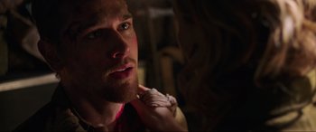 Movie still from “Shadow in the Cloud” (2020), directed by Roseanne Liang – A person with a beard; Close Up shot, Over the shoulder angle