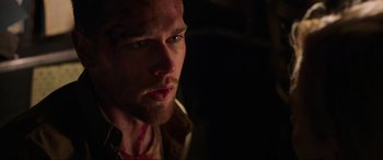 Movie still from “Shadow in the Cloud” (2020), directed by Roseanne Liang – A person with blood all over his face; Close Up shot, Low angle