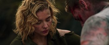 Movie still from “Shadow in the Cloud” (2020), directed by Roseanne Liang – A person with their head down; Close Up shot, Over the shoulder angle