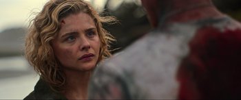 Movie still from “Shadow in the Cloud” (2020), directed by Roseanne Liang – A person looking at a person; Close Up shot, Over the shoulder angle