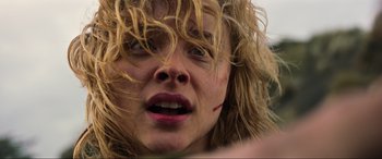 Movie still from “Shadow in the Cloud” (2020), directed by Roseanne Liang – A person's face with a wound on it's face; Close Up shot, Low angle