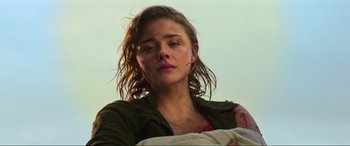 Movie still from “Shadow in the Cloud” (2020), directed by Roseanne Liang – A woman with a bandage on her arm; Close Up shot, Low angle