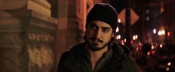 Movie still from “Shaft” (2019), directed by Tim Story – A person wearing a hat; Close Up shot, Over the shoulder angle