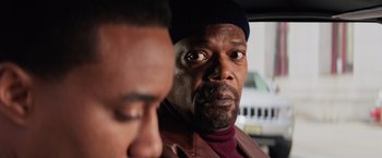 Movie still from “Shaft” (2019), directed by Tim Story – A person in a car; Close Up shot, Over the shoulder angle