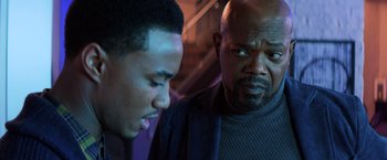 Movie still from “Shaft” (2019), directed by Tim Story – A man and a boy are looking at each other; Close Up shot, Over the shoulder angle