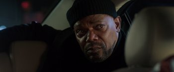 Movie still from “Shaft” (2019), directed by Tim Story – A person wearing a hat; Close Up shot, Low angle