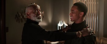 Movie still from “Shaft” (2019), directed by Tim Story – A man and a man in a black sweater; Medium shot, Over the shoulder angle