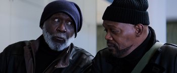 Movie still from “Shaft” (2019), directed by Tim Story – Two older black men sitting next to each other; Close Up shot, Over the shoulder angle