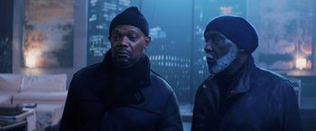 Movie still from “Shaft” (2019), directed by Tim Story – Two black men standing next to each other in the dark; Medium shot, Low angle