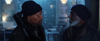 Movie still from “Shaft” (2019), directed by Tim Story – Two men are standing in a room talking to each other; Close Up shot, Over the shoulder angle