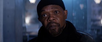Movie still from “Shaft” (2019), directed by Tim Story – A man with a beard and a black hat; Close Up shot, Low angle