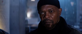 Movie still from “Shaft” (2019), directed by Tim Story – A person wearing a hat; Close Up shot, Over the shoulder angle