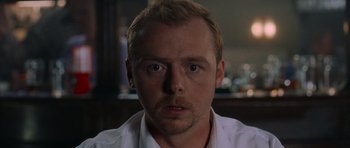 Movie still from “Shaun of the Dead” (2004), directed by Edgar Wright – Close Up shot, Over the shoulder angle