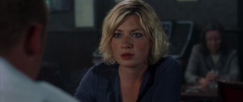 Movie still from “Shaun of the Dead” (2004), directed by Edgar Wright – A person with blonde hair; Close Up shot, Over the shoulder angle