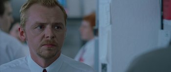 Movie still from “Shaun of the Dead” (2004), directed by Edgar Wright – A person wearing a white shirt and tie; Close Up shot, Low angle