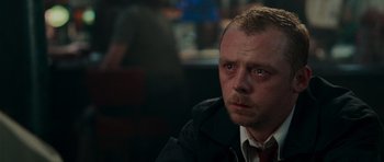 Movie still from “Shaun of the Dead” (2004), directed by Edgar Wright – A person wearing a jacket; Close Up shot, Low angle